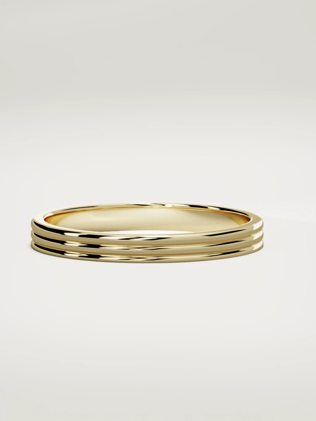 The Doble double-groove men's wedding band in 14K yellow gold, 3 mm, three-quarter view