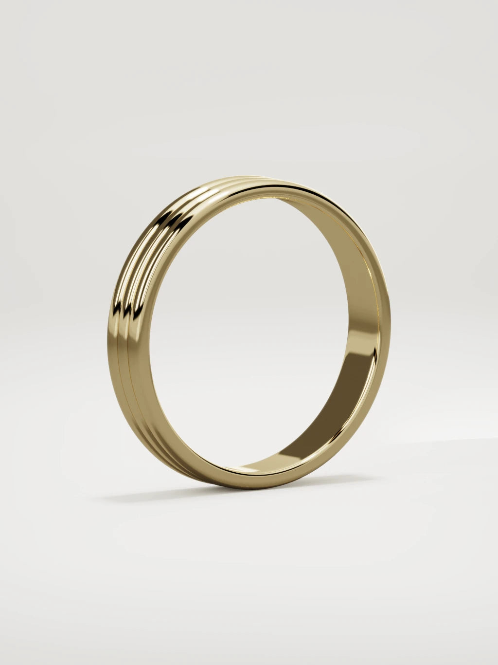 The Doble double-groove men's wedding band in 14K yellow gold, 4 mm, standing three-quarter view