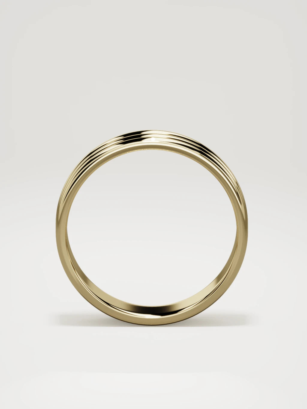 The Doble double-groove men's wedding band in 14K yellow gold, 6 mm, standing front view