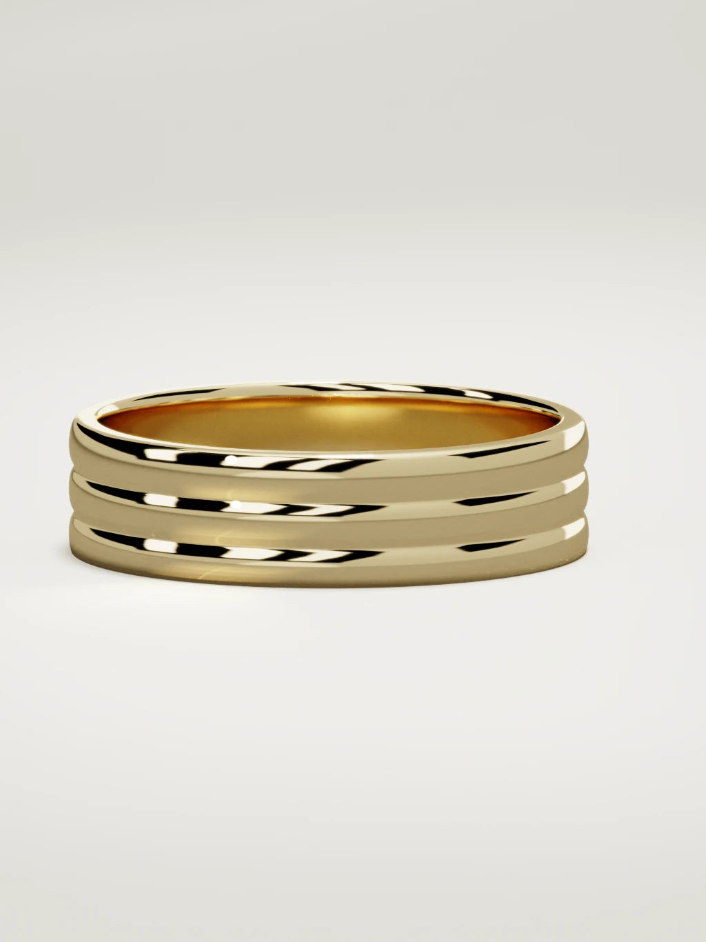 The Doble double-groove men's wedding band in 14K yellow gold, 6 mm, three-quarter view