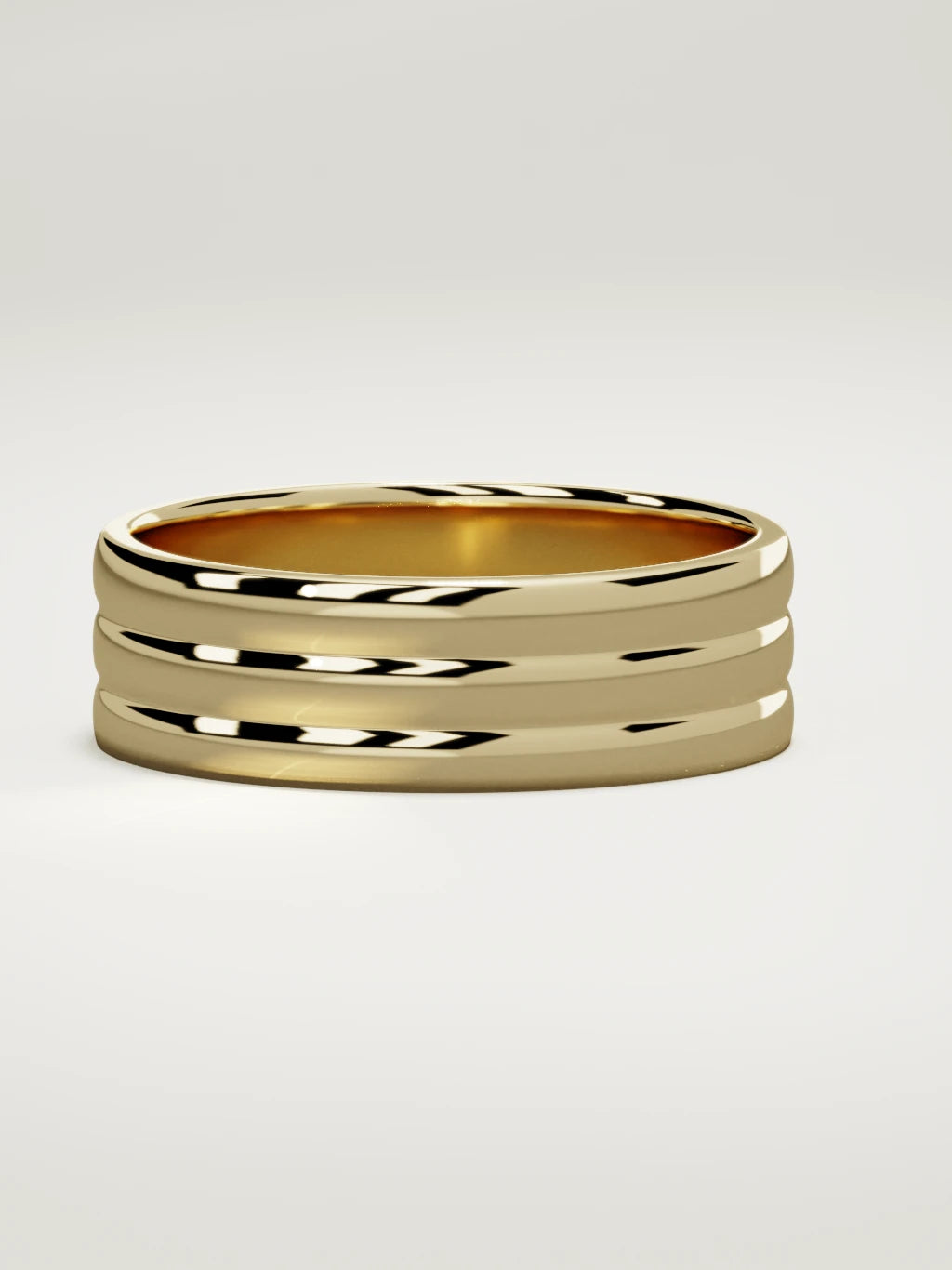 The Doble double-groove men's wedding band in 14K yellow gold, 7 mm, three-quarter view