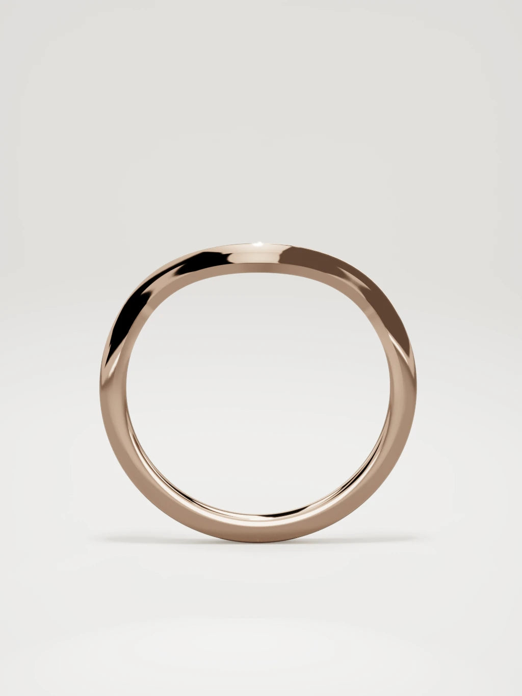 The Eco contour wedding band in 14K rose gold, standing front view