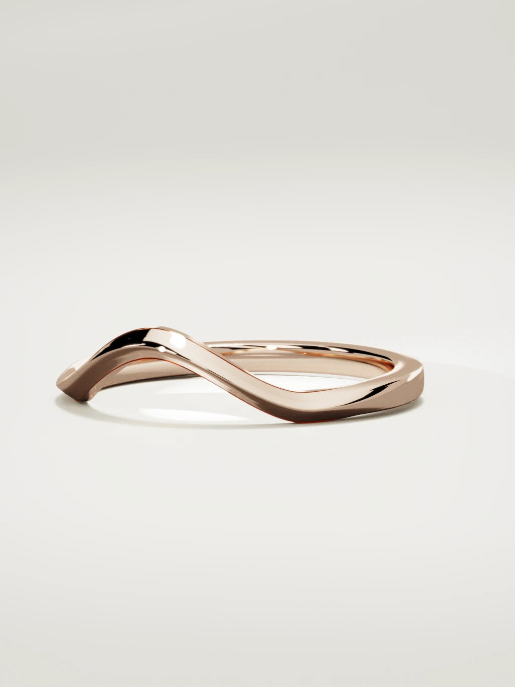 The Eco contour wedding band in 14K rose gold, three-quarter view