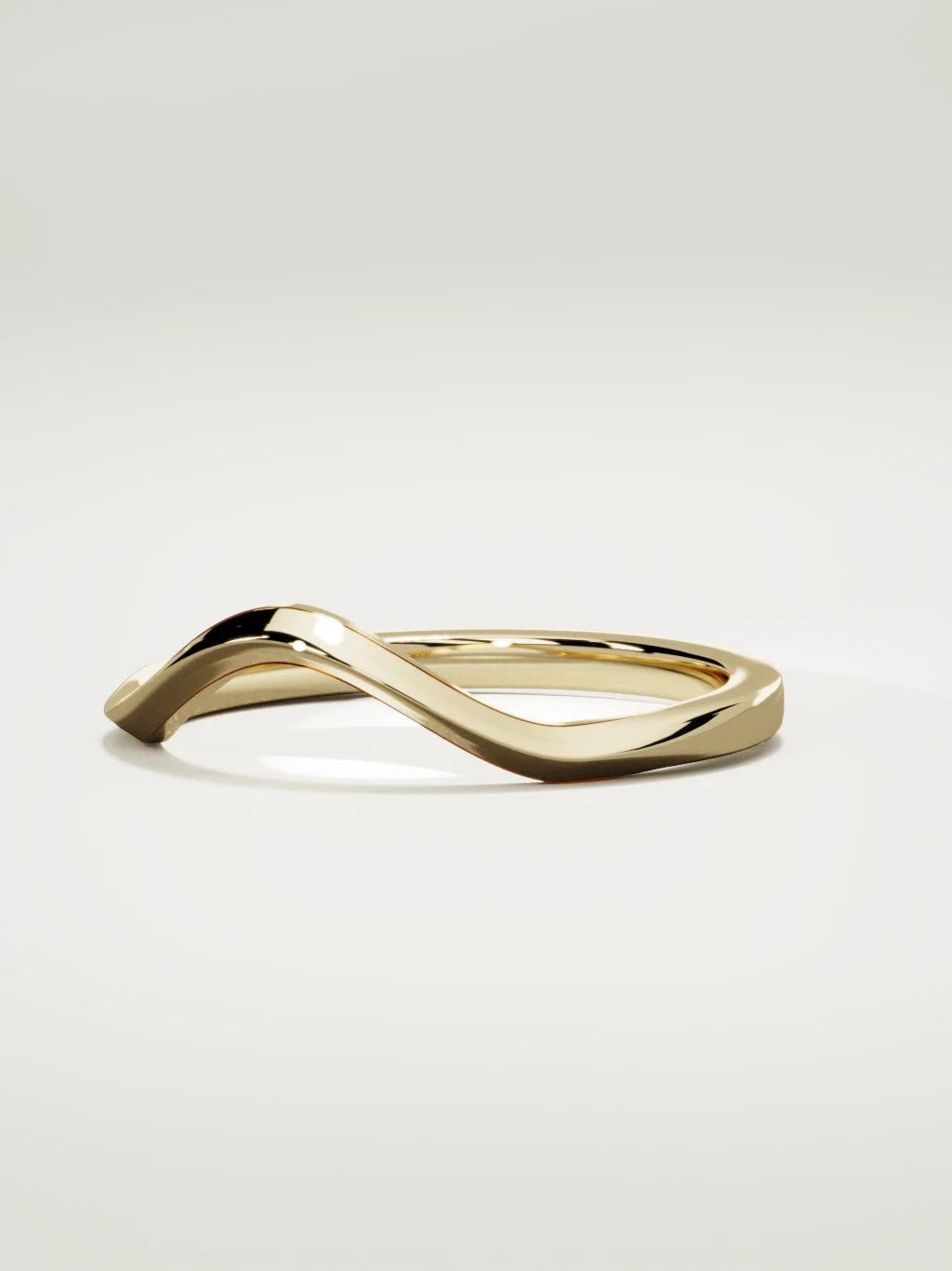 The Eco contour wedding band in 14K yellow gold, three-quarter view