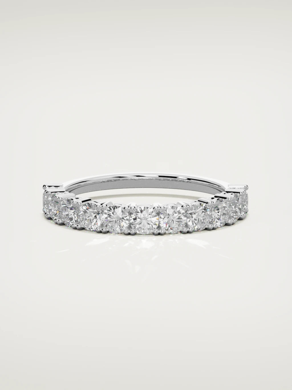 The Gloria open-prong half eternity band in 14K white gold, front view