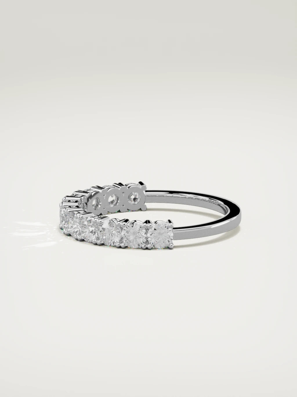 The Gloria open-prong half eternity band in 14K white gold, side view