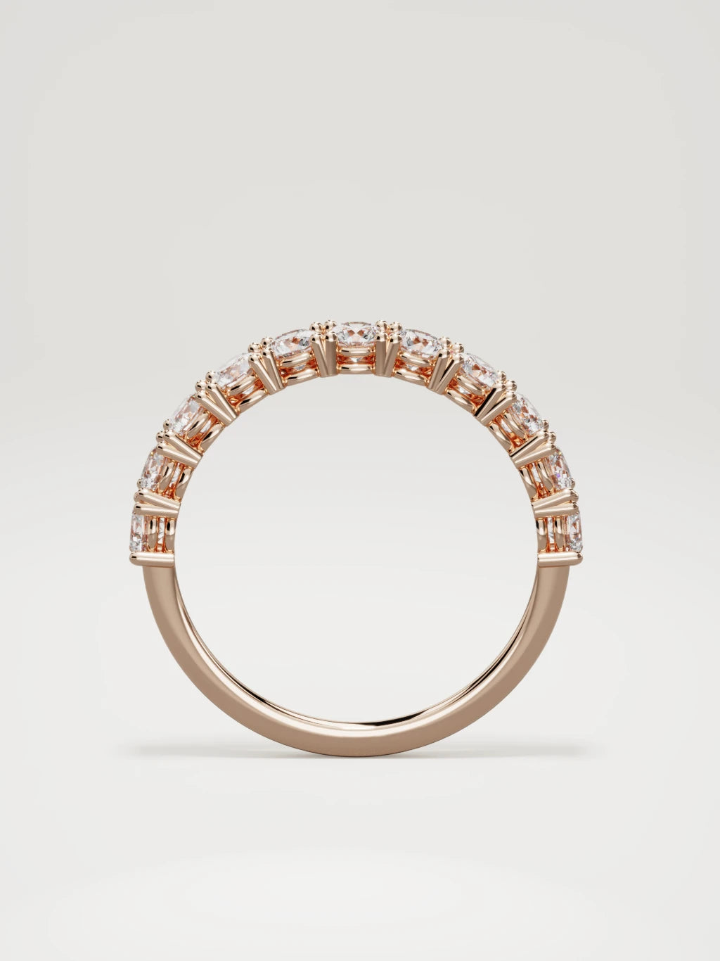 The Gloria open-prong half eternity band in 14K rose gold, standing front view