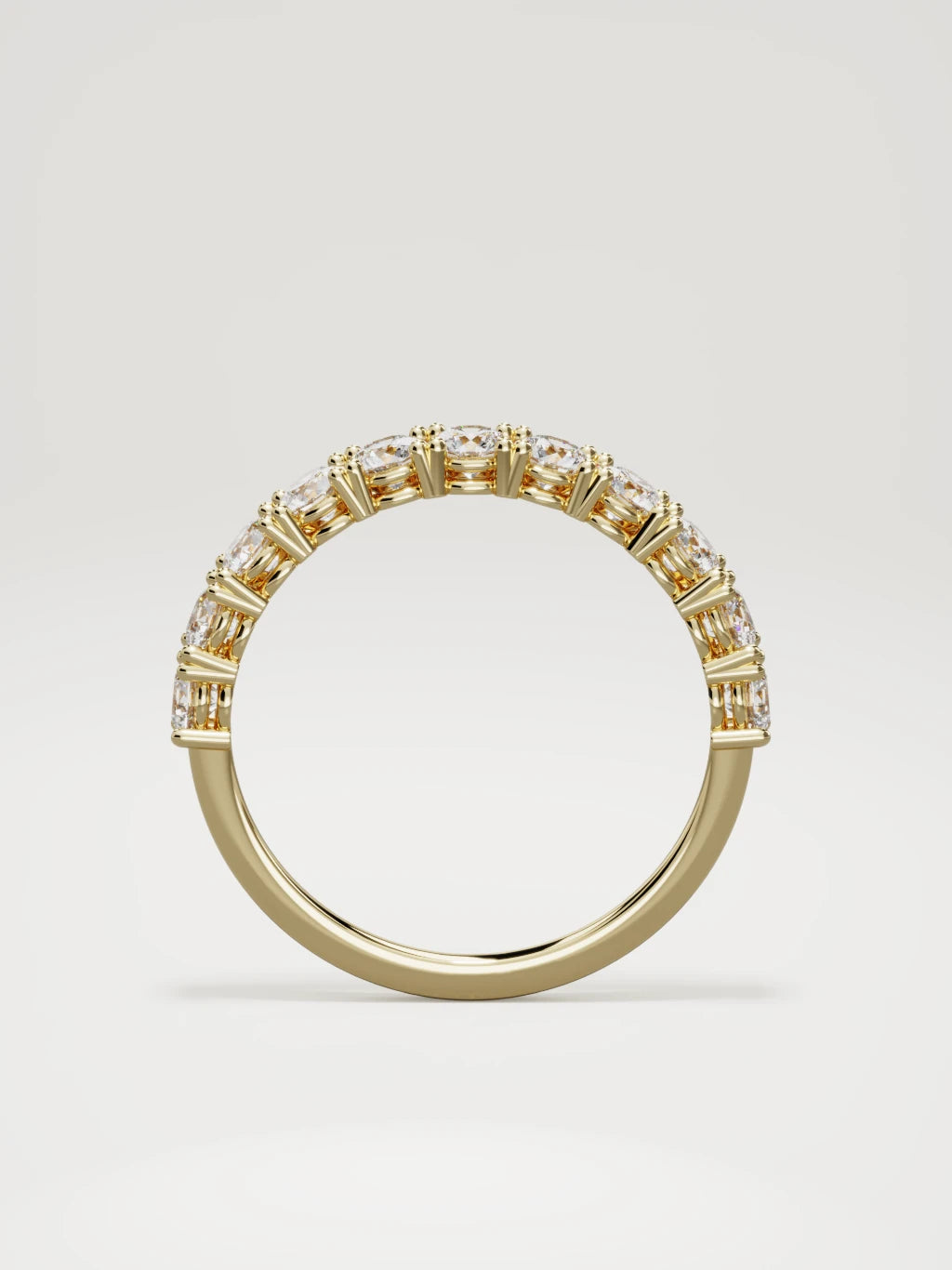 The Gloria open-prong half eternity band in 14K yellow gold, standing front view