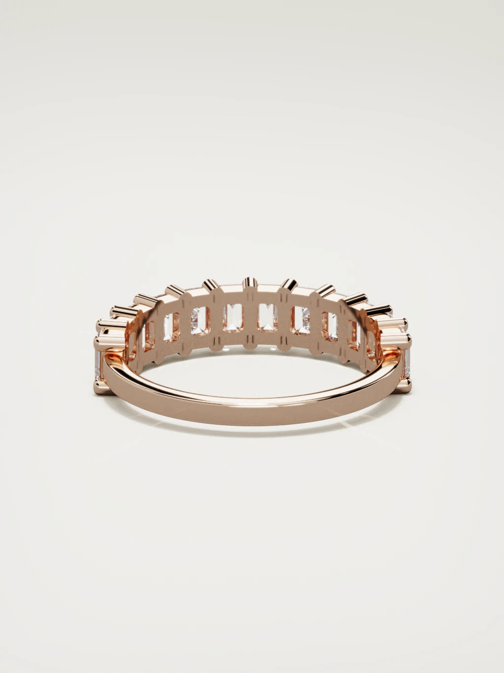 The Gracia prong emerald-cut half eternity band in 14K rose gold, back view
