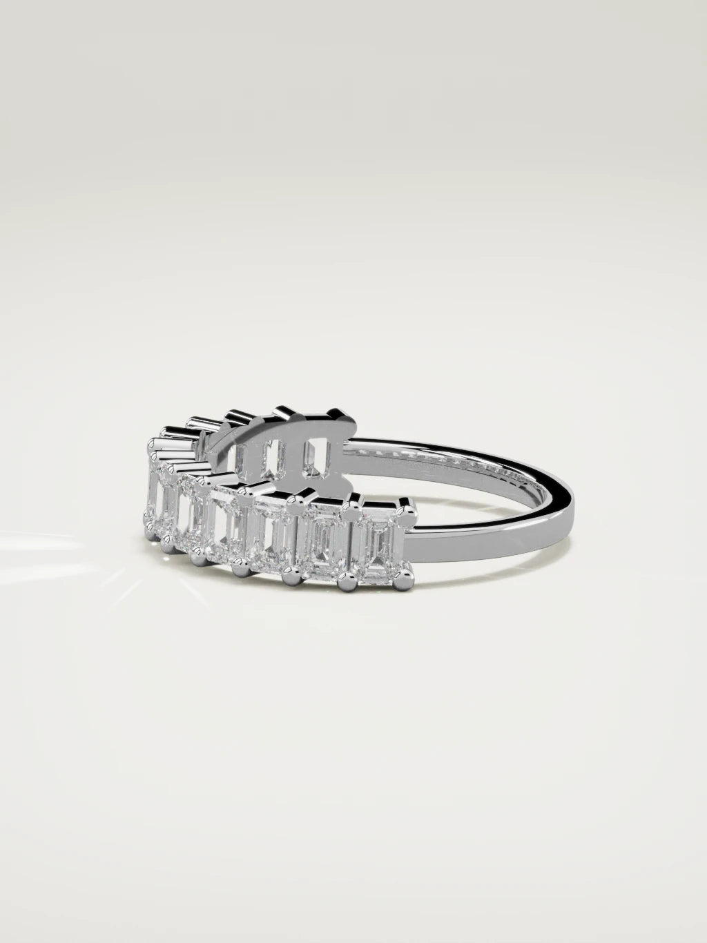 The Gracia prong emerald-cut half eternity band in 14K white gold, side view
