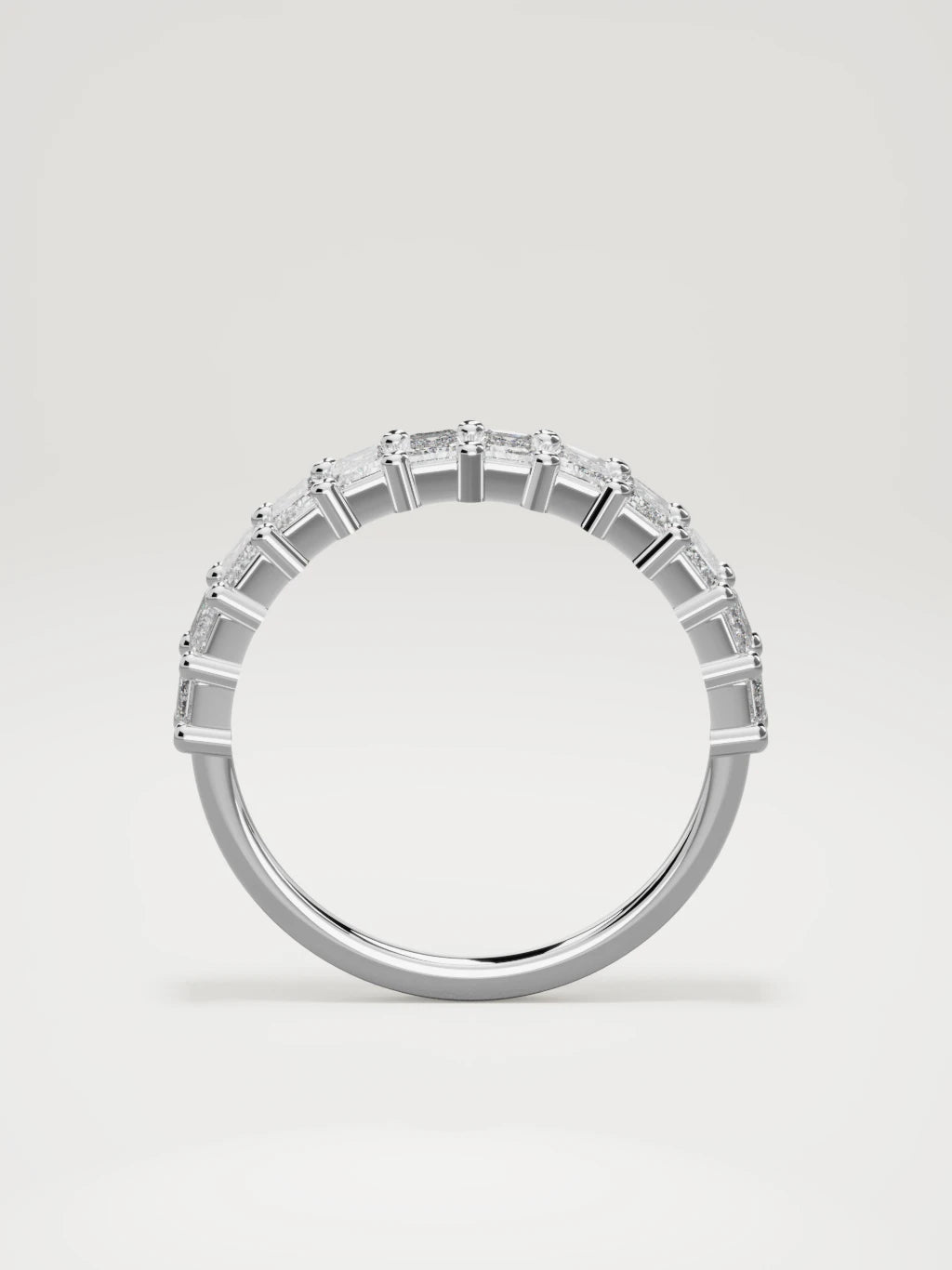 The Gracia prong emerald-cut half eternity band in 14K white gold, standing front view