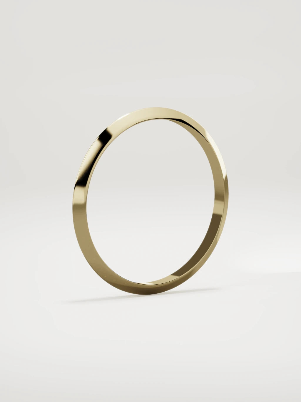 The Filo knife-edge men's wedding band in 14K yellow gold, 2 mm, standing three-quarter view