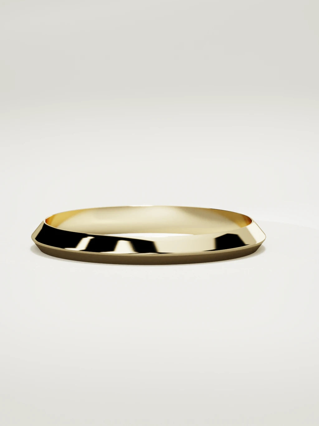 The Filo knife-edge men's wedding band in 14K yellow gold, 3 mm, three-quarter view