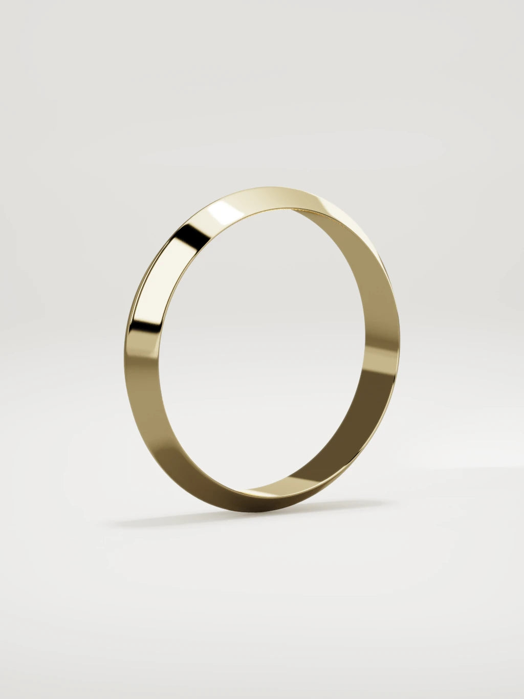 The Filo knife-edge men's wedding band in 14K yellow gold, 4 mm, standing three-quarter view