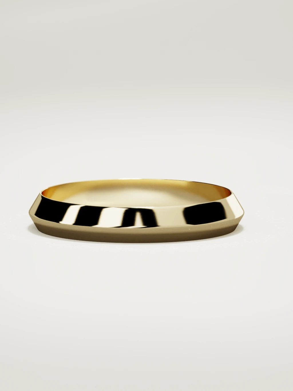 The Filo knife-edge men's wedding band in 14K yellow gold, 4 mm, three-quarter view