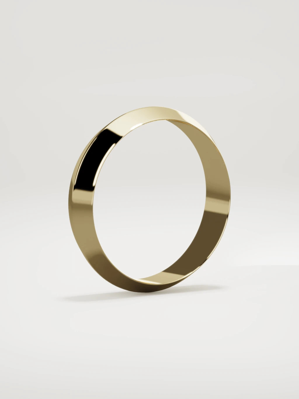The Filo knife-edge men's wedding band in 14K yellow gold, 5 mm, standing three-quarter view