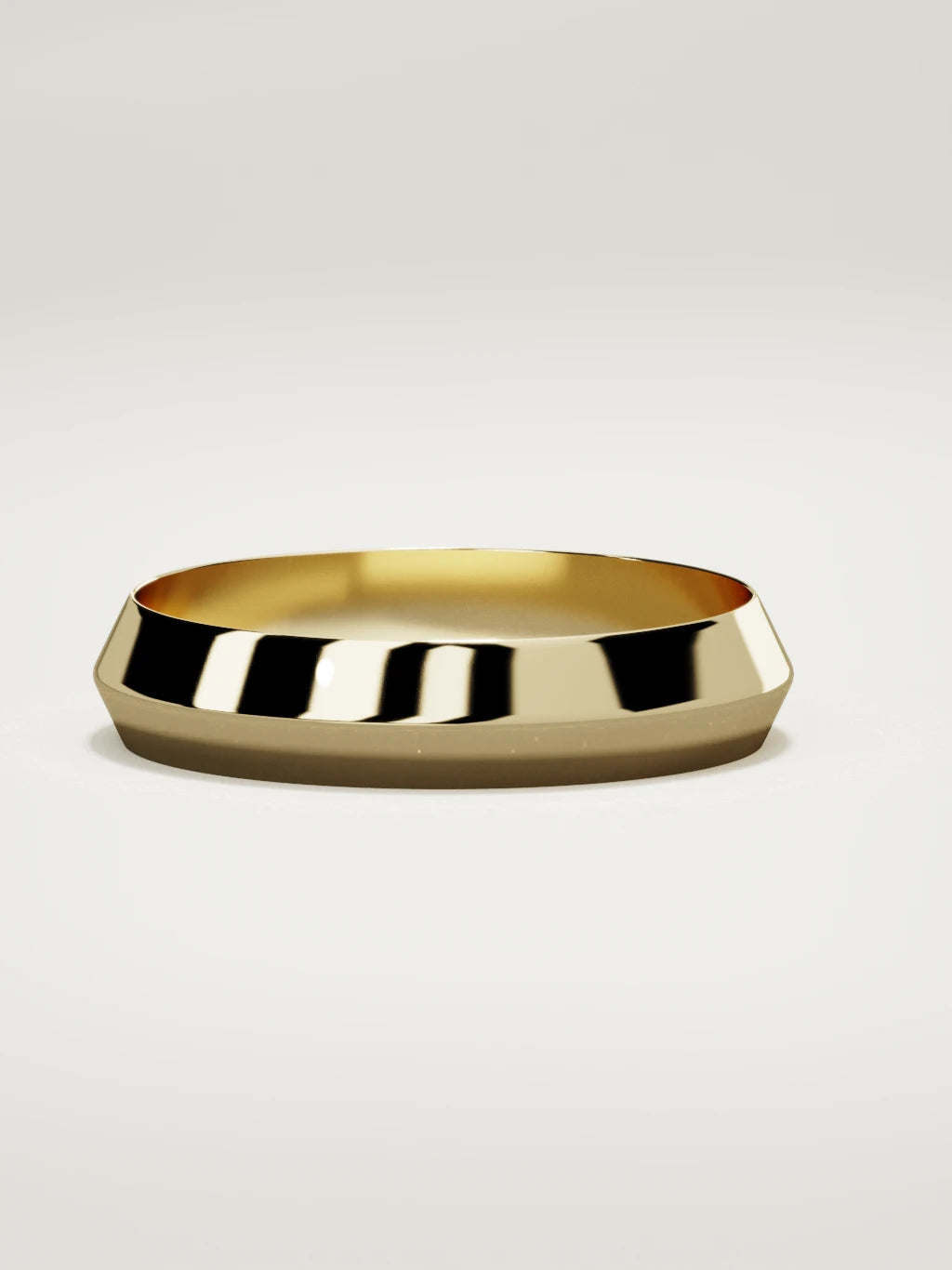 The Filo knife-edge men's wedding band in 14K yellow gold, 5 mm, three-quarter view