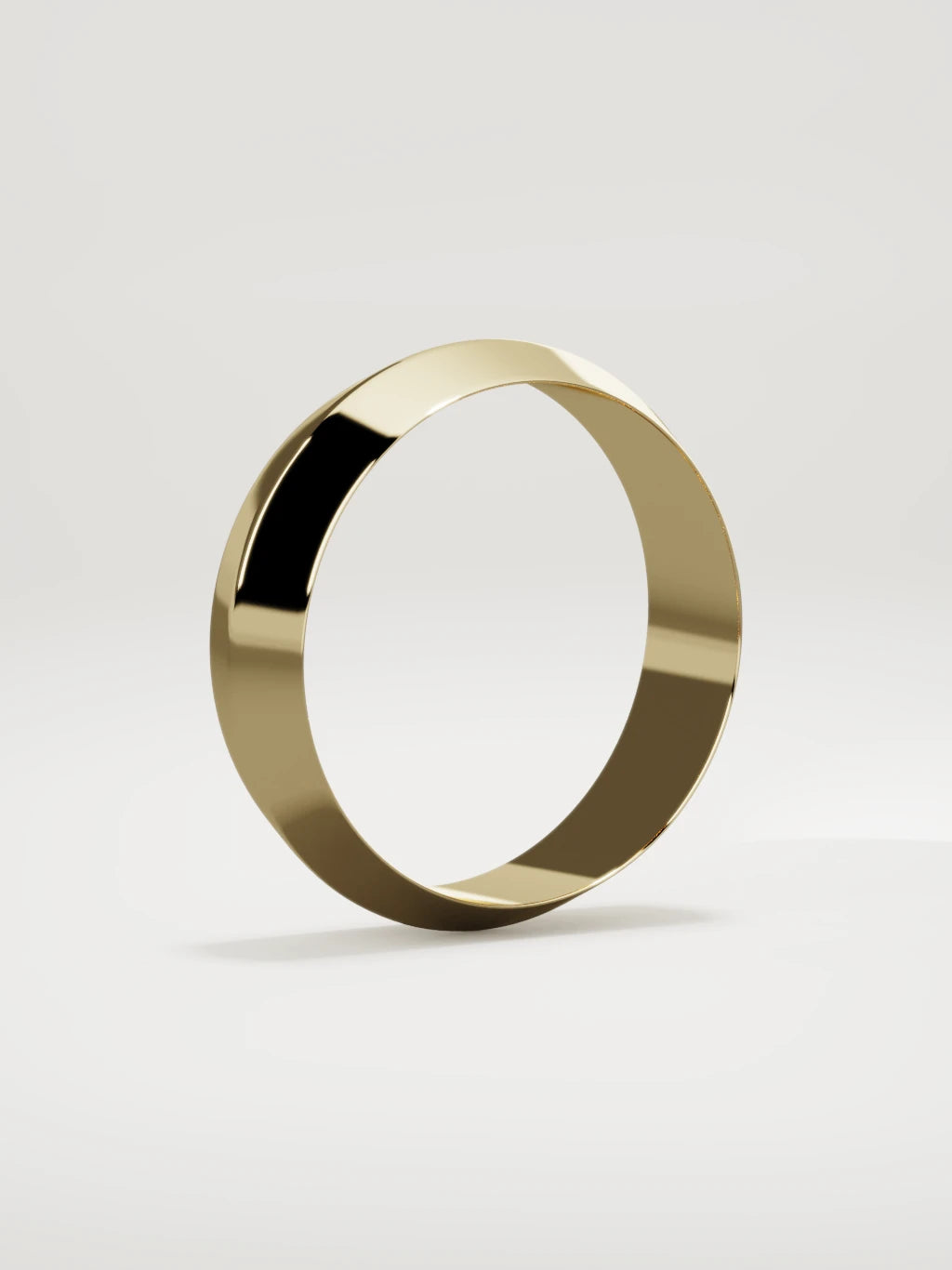The Filo knife-edge men's wedding band in 14K yellow gold, 6 mm, standing three-quarter view