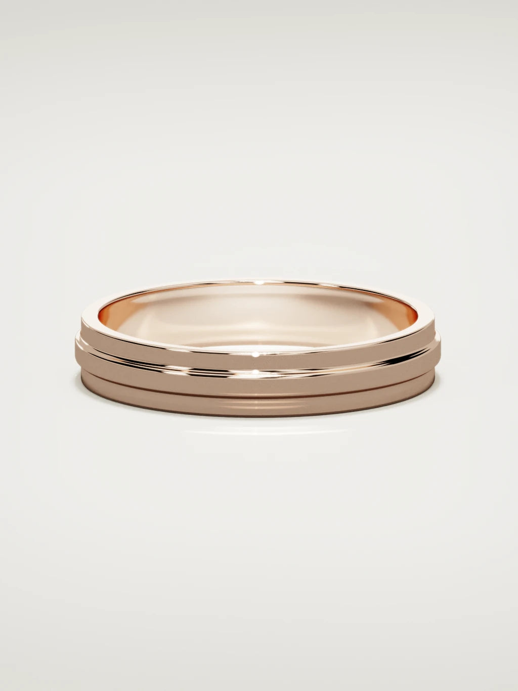 The Linea center-ridge men's wedding band in 14K rose gold, 4 mm, front view