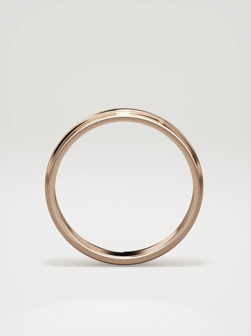 The Linea center-ridge men's wedding band in 14K rose gold, 4 mm, standing front view