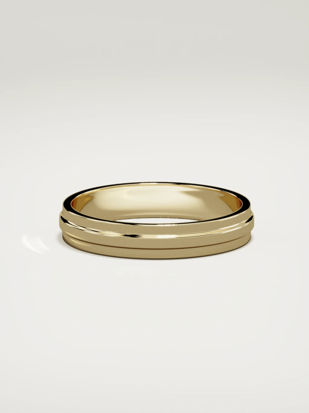 The Linea center-ridge men's wedding band in 14K yellow gold, 4 mm, side view