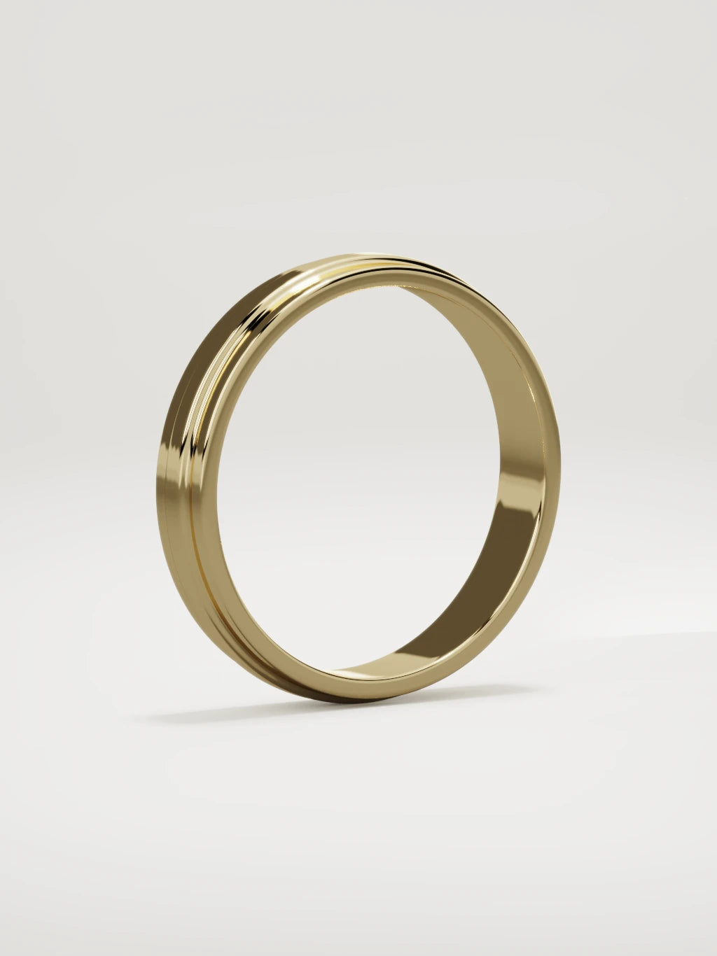 The Linea center-ridge men's wedding band in 14K yellow gold, 4 mm, standing three-quarter view