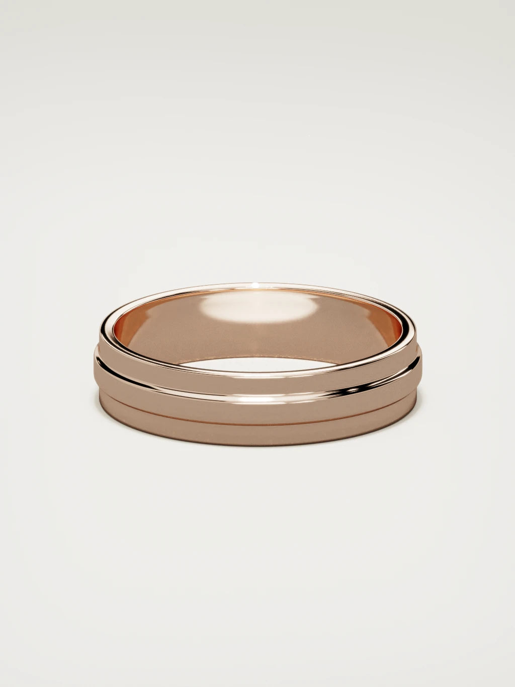 The Linea center-ridge men's wedding band in 14K rose gold, 5 mm, back view
