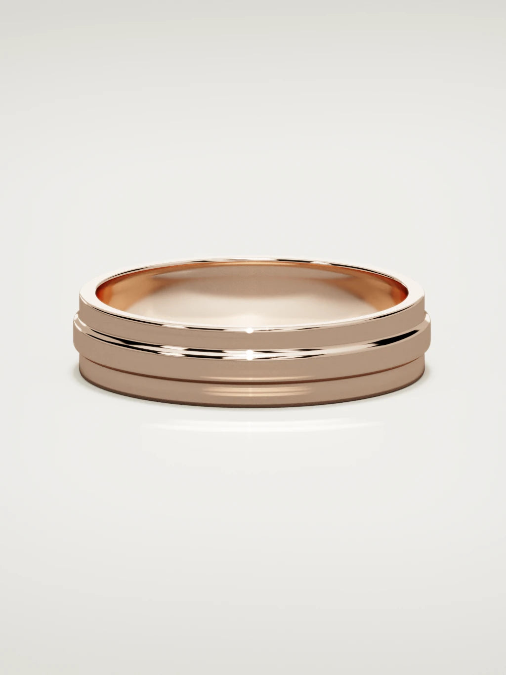 The Linea center-ridge men's wedding band in 14K rose gold, 5 mm, front view