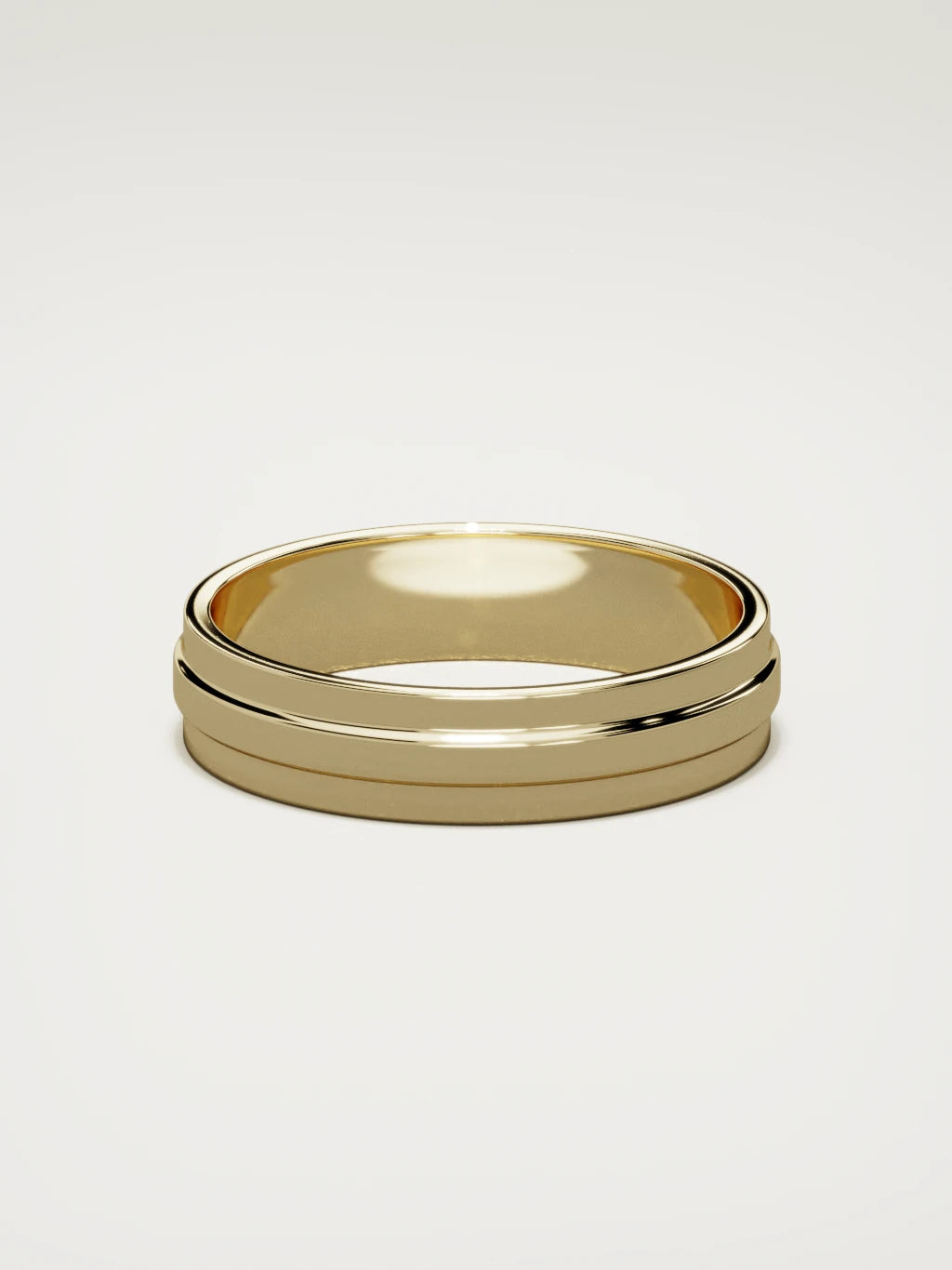 The Linea center-ridge men's wedding band in 14K yellow gold, 5 mm, back view