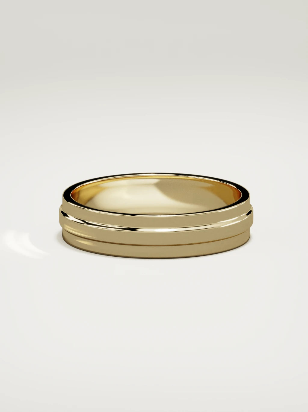 The Linea center-ridge men's wedding band in 14K yellow gold, 5 mm, side view