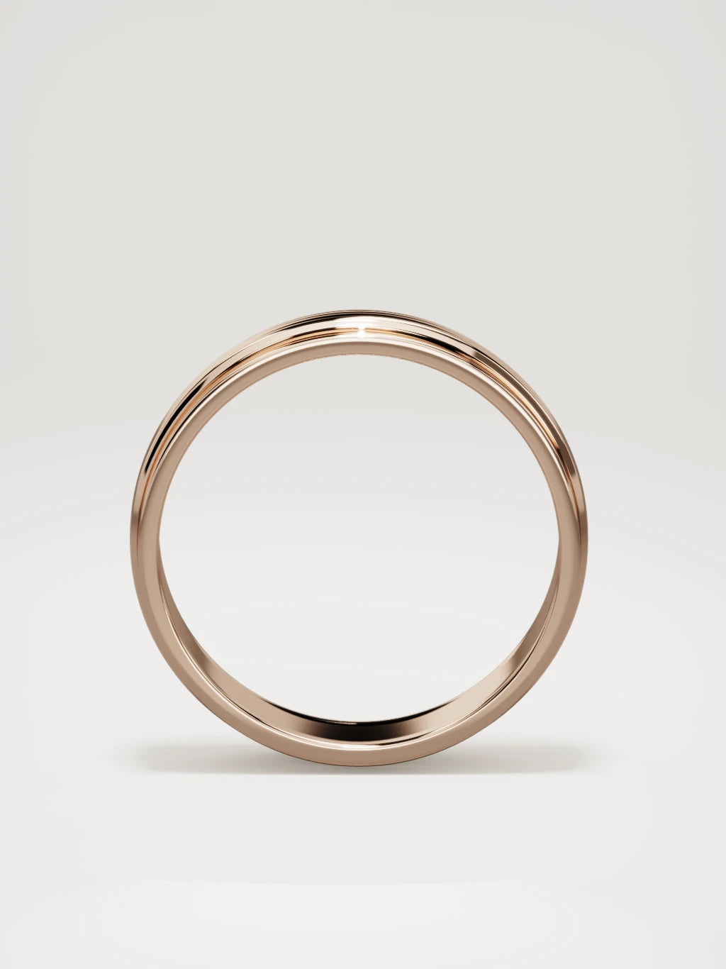 The Linea center-ridge men's wedding band in 14K rose gold, 6 mm, standing front view