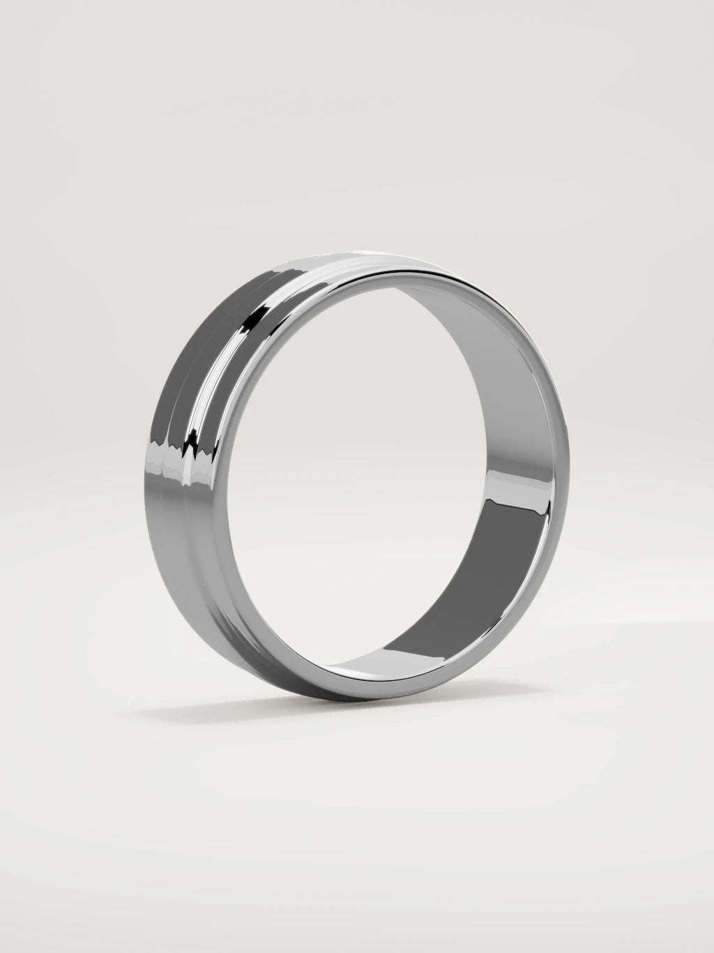 The Linea center-ridge men's wedding band in 14K white gold, 6 mm, standing three-quarter view