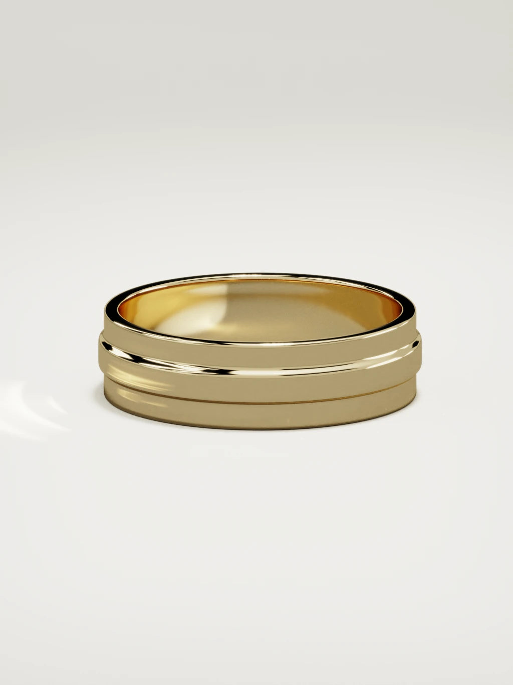 The Linea center-ridge men's wedding band in 14K yellow gold, 6 mm, side view