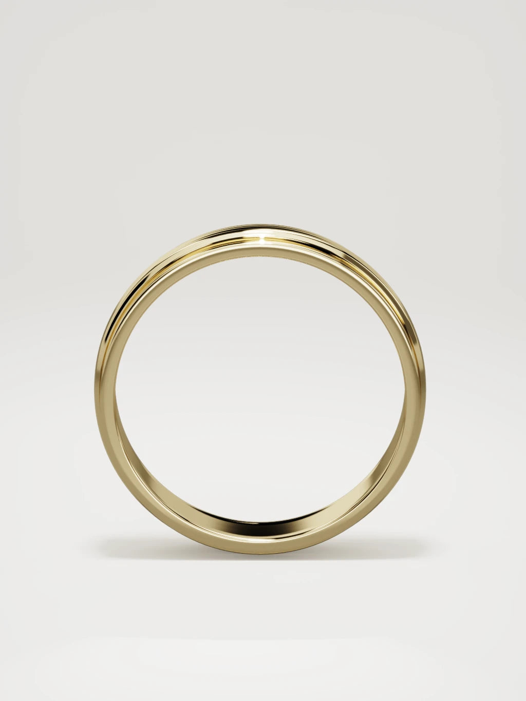 The Linea center-ridge men's wedding band in 14K yellow gold, 6 mm, standing front view