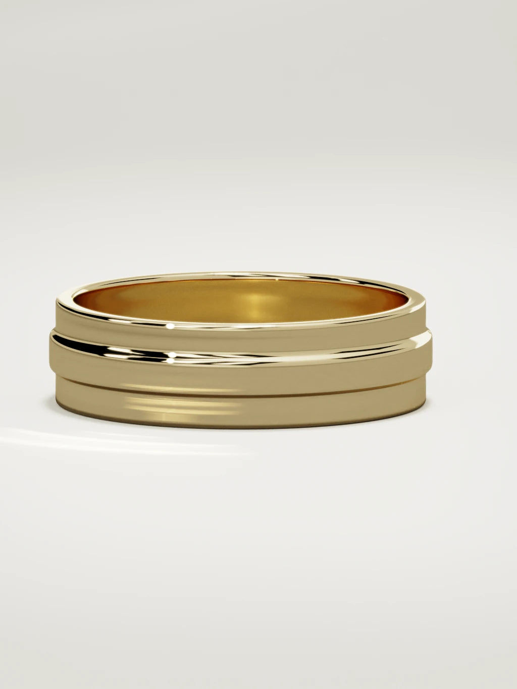The Linea center-ridge men's wedding band in 14K yellow gold, 6 mm, three-quarter view