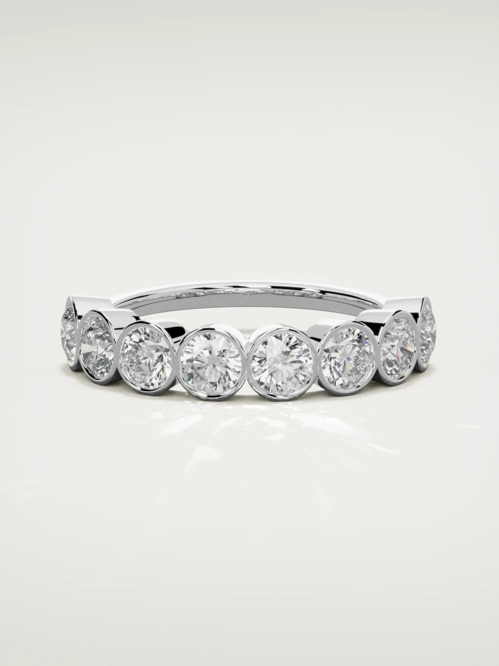 The Lumen large bezel bubble half eternity band in 14K white gold, front view