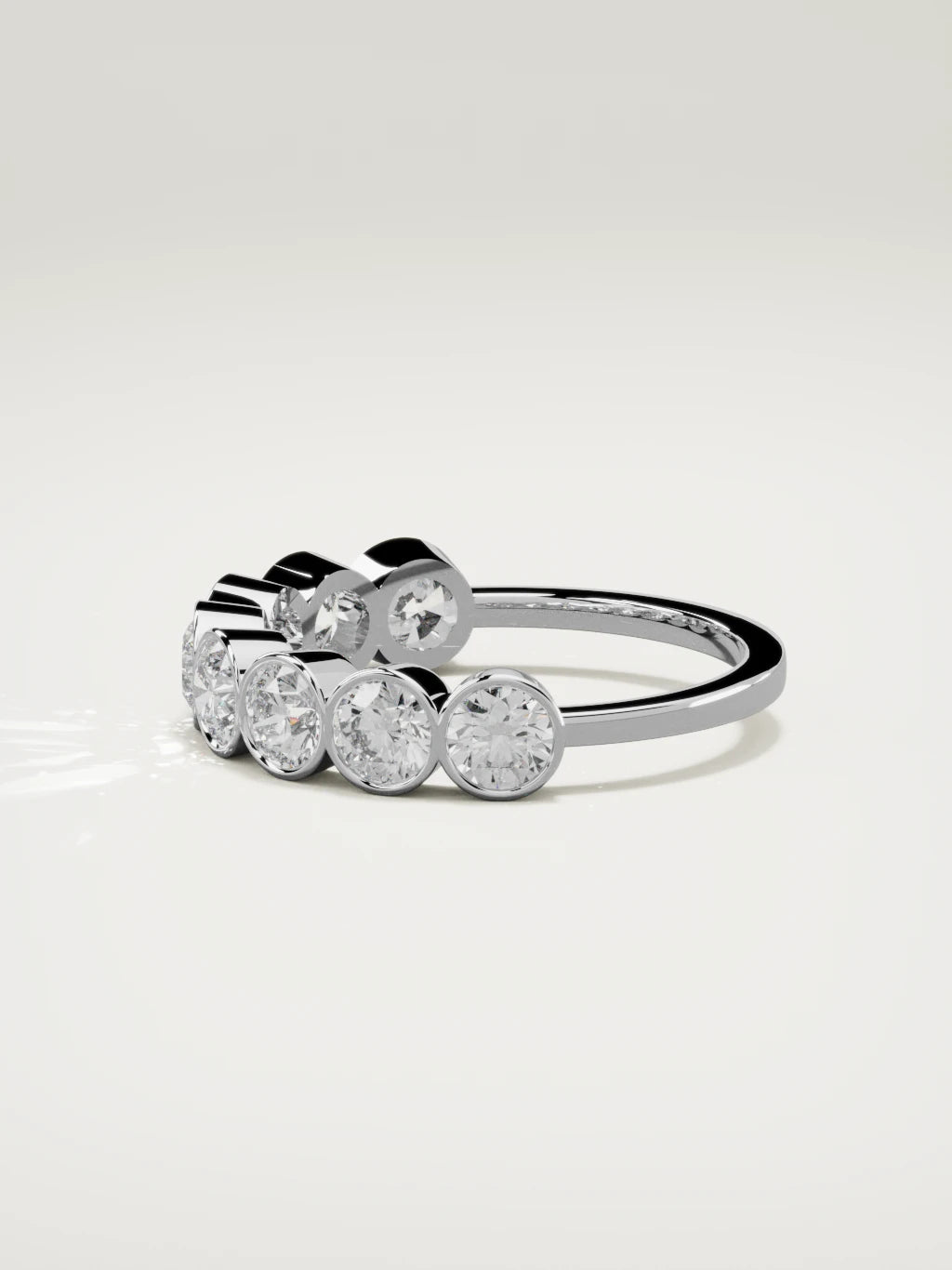 The Lumen large bezel bubble half eternity band in 14K white gold, side view