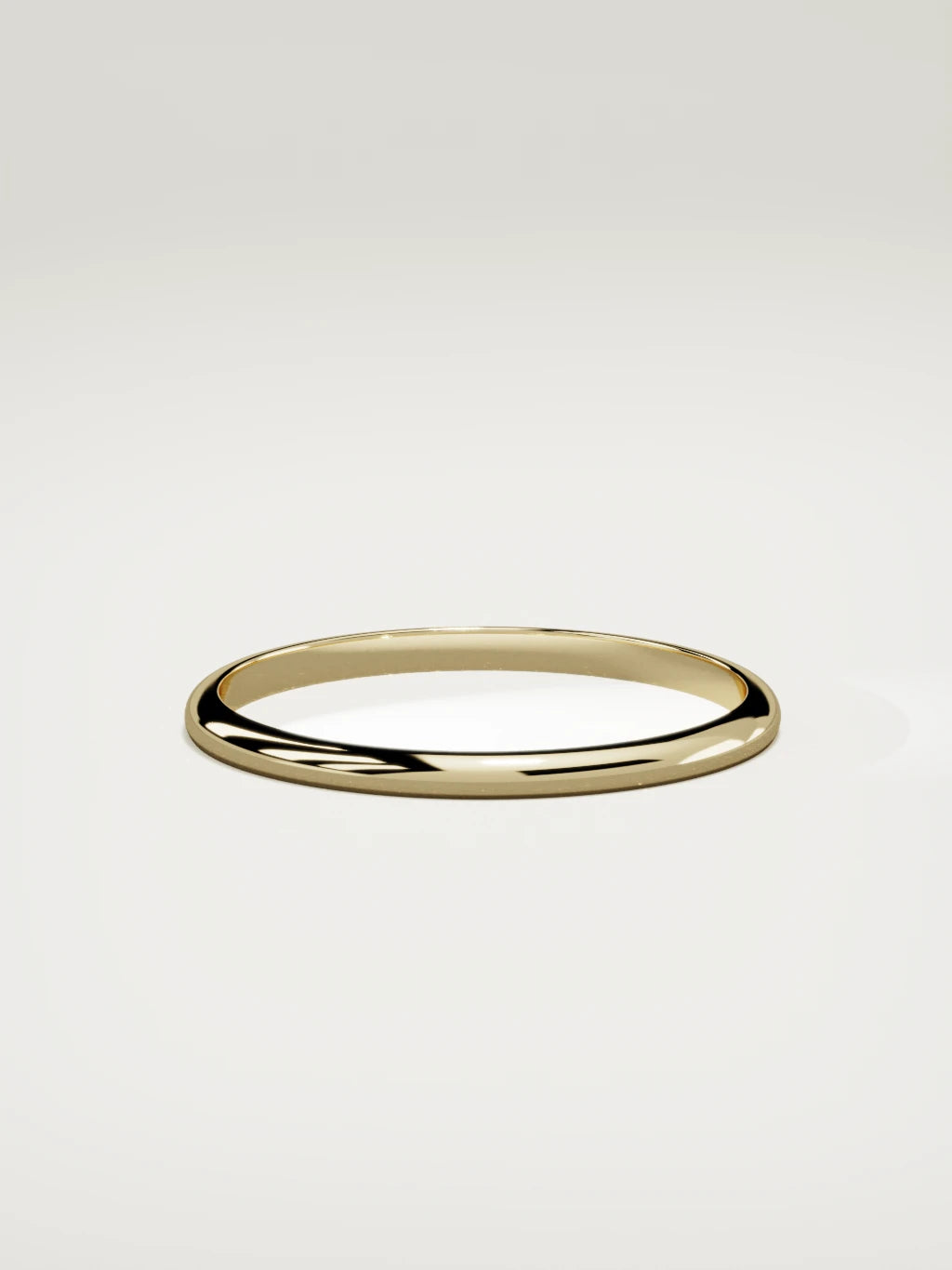 The Domo domed men's wedding band in 14K yellow gold, 2 mm, side view