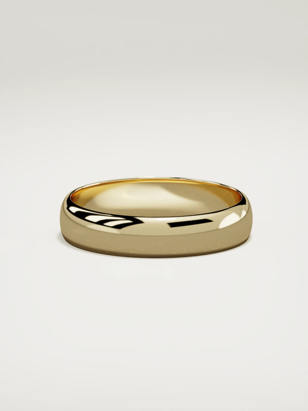 The Domo domed men's wedding band in 14K yellow gold, 5 mm, side view