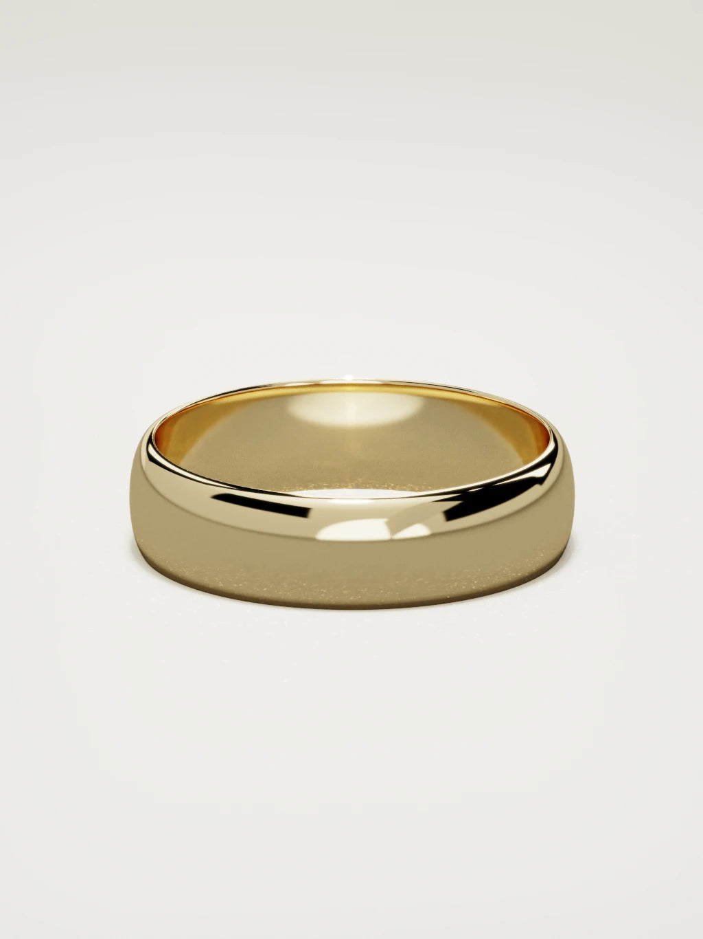 The Domo domed men's wedding band in 14K yellow gold, 6 mm, back view