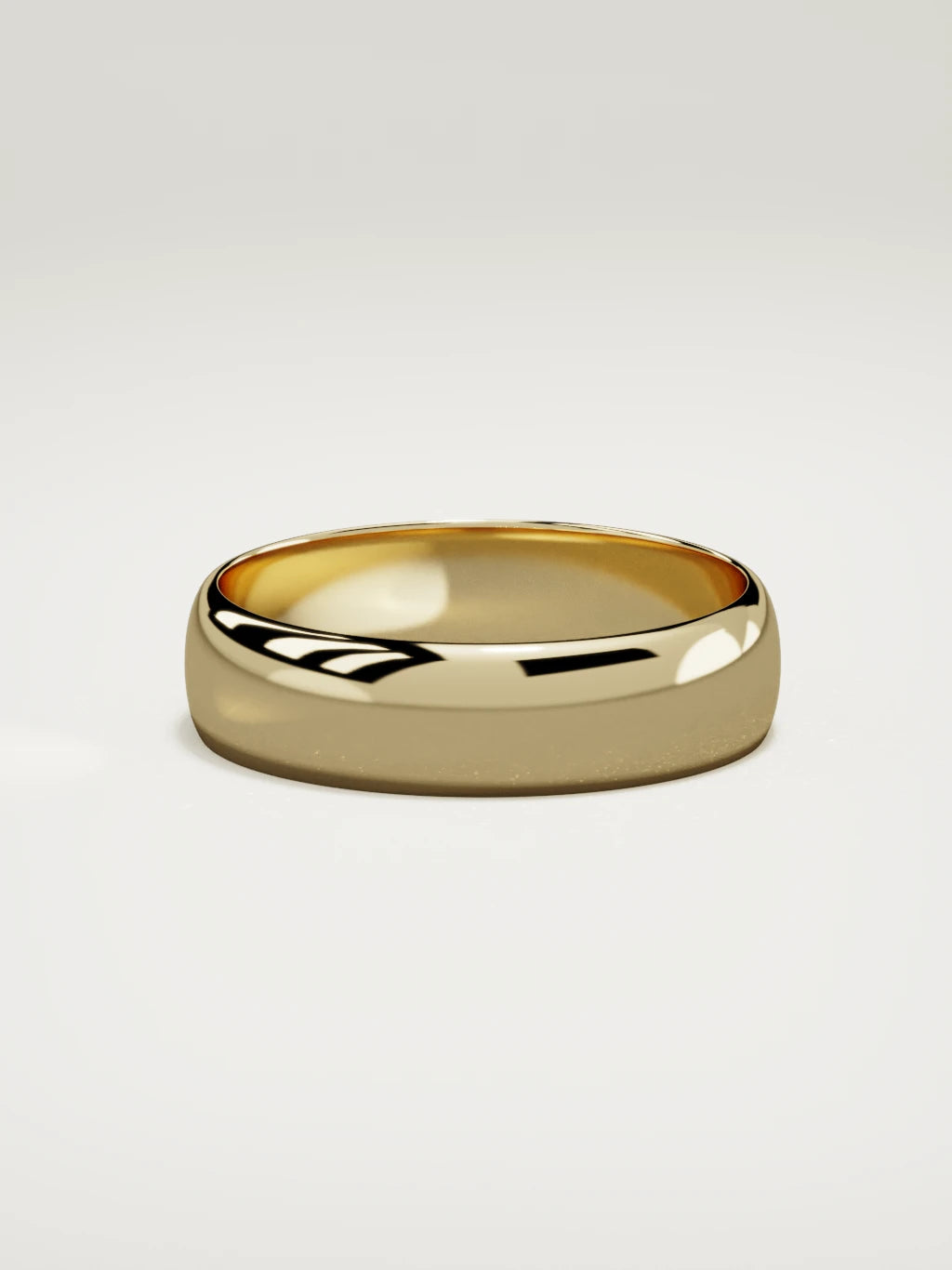 The Domo domed men's wedding band in 14K yellow gold, 6 mm, side view