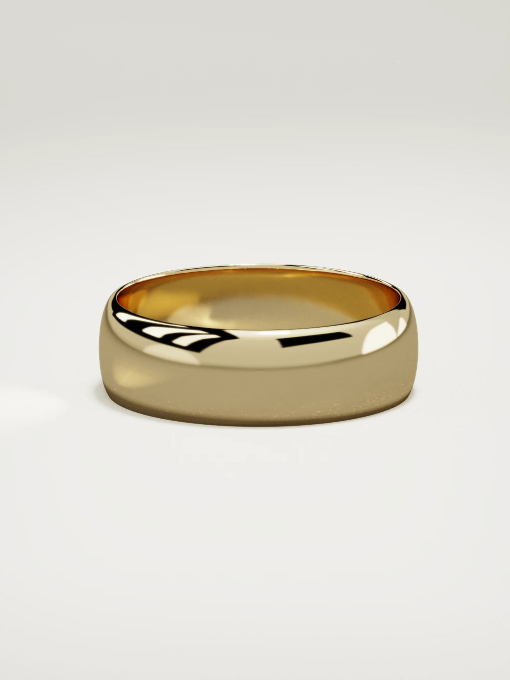 The Domo domed men's wedding band in 14K yellow gold, 7 mm, side view