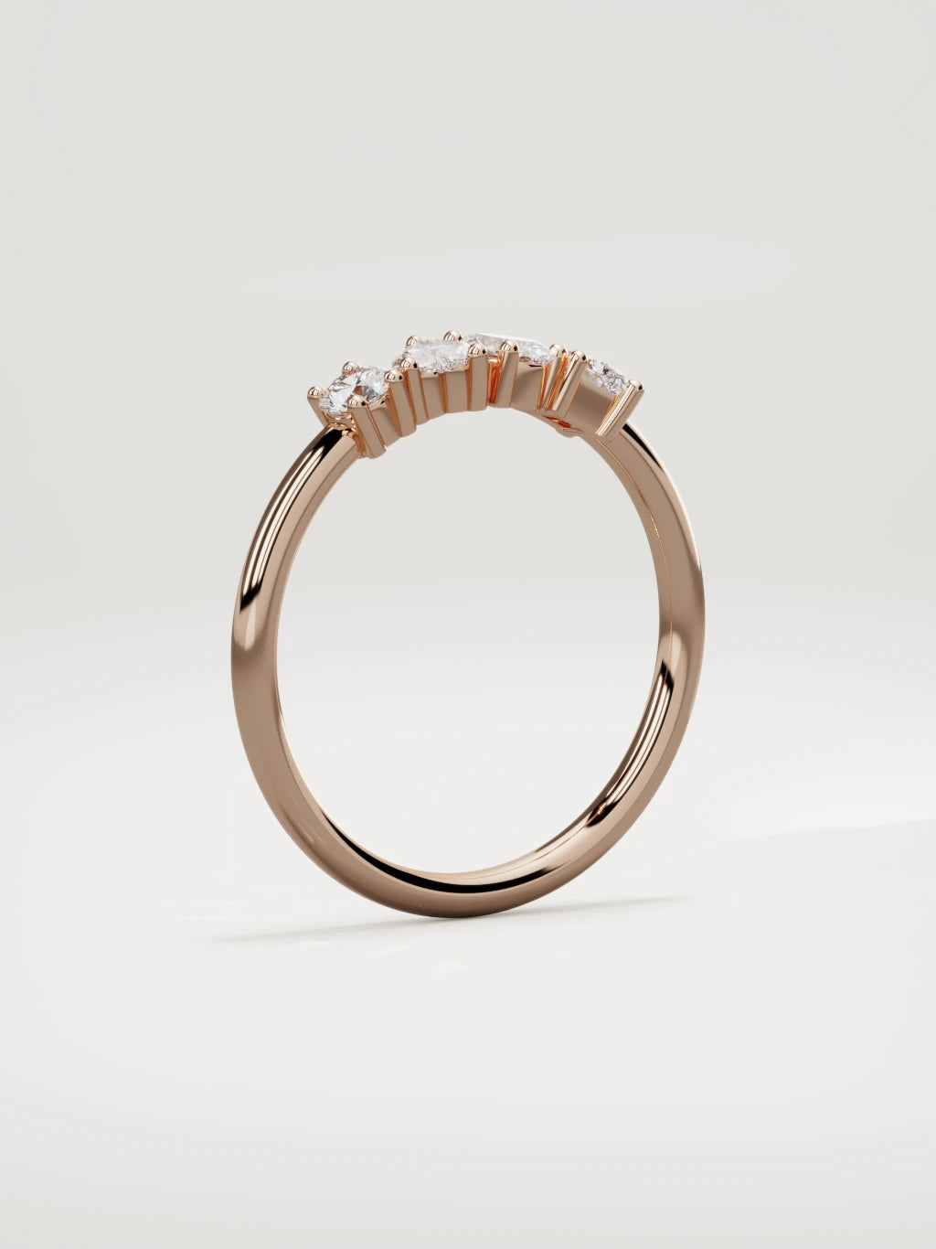 The Mixta mixed shape diamond ring in 14K rose gold, standing three-quarter view