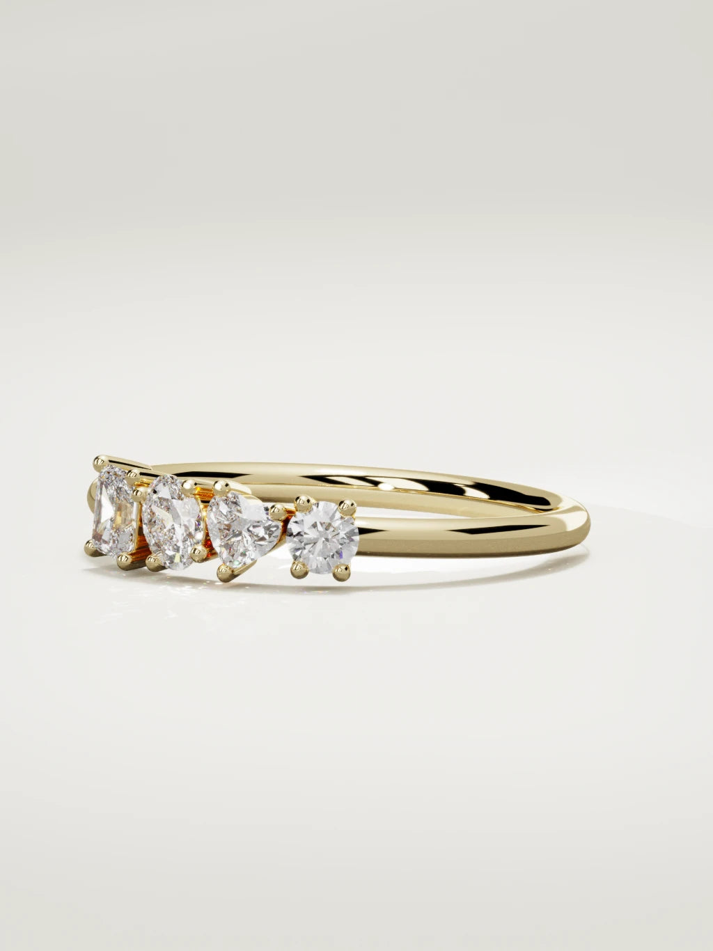 The Mixta mixed shape diamond ring in 14K yellow gold, three-quarter view