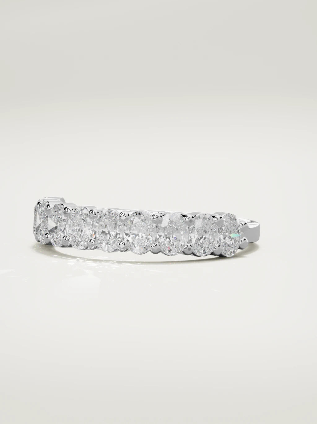 The Musa north-south oval half eternity band in 14K white gold, three-quarter view