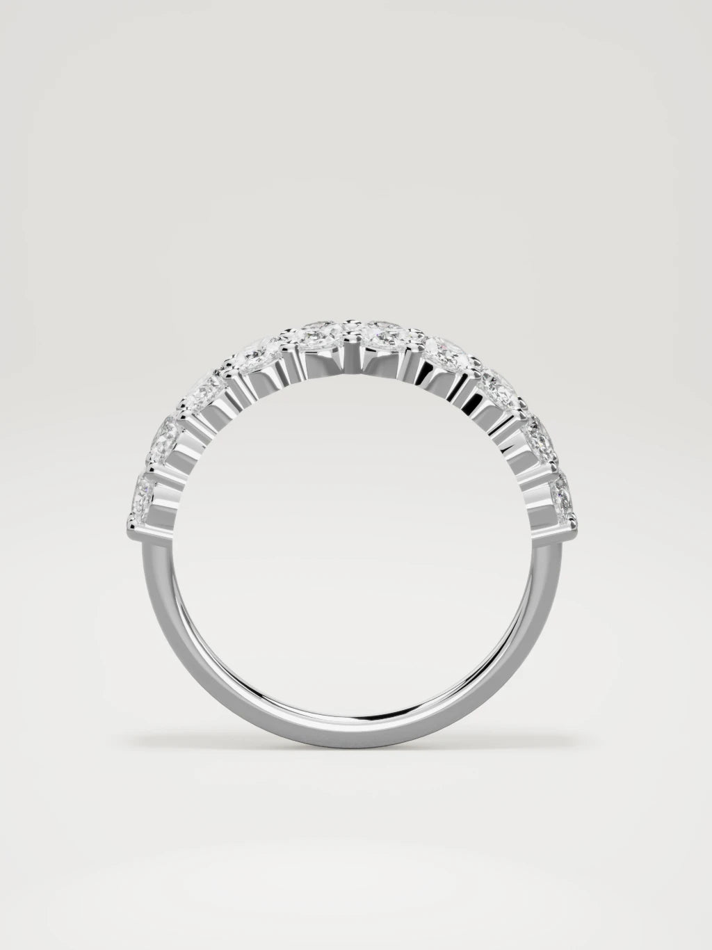 The Musa north-south oval half eternity band in 14K white gold, standing front view