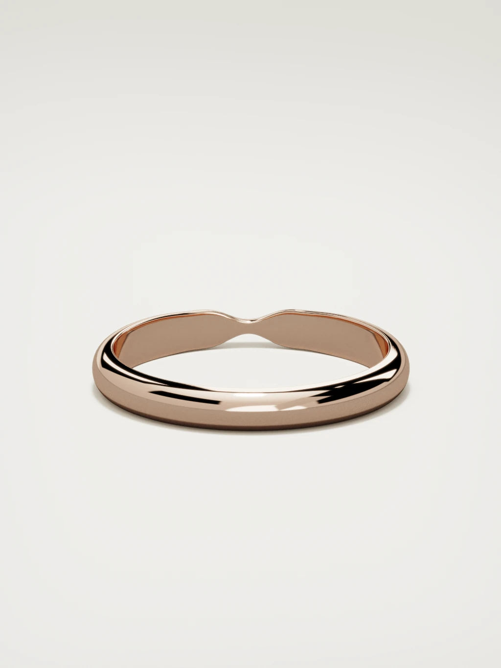 The Nido notched contour wedding band in 14K rose gold, back view