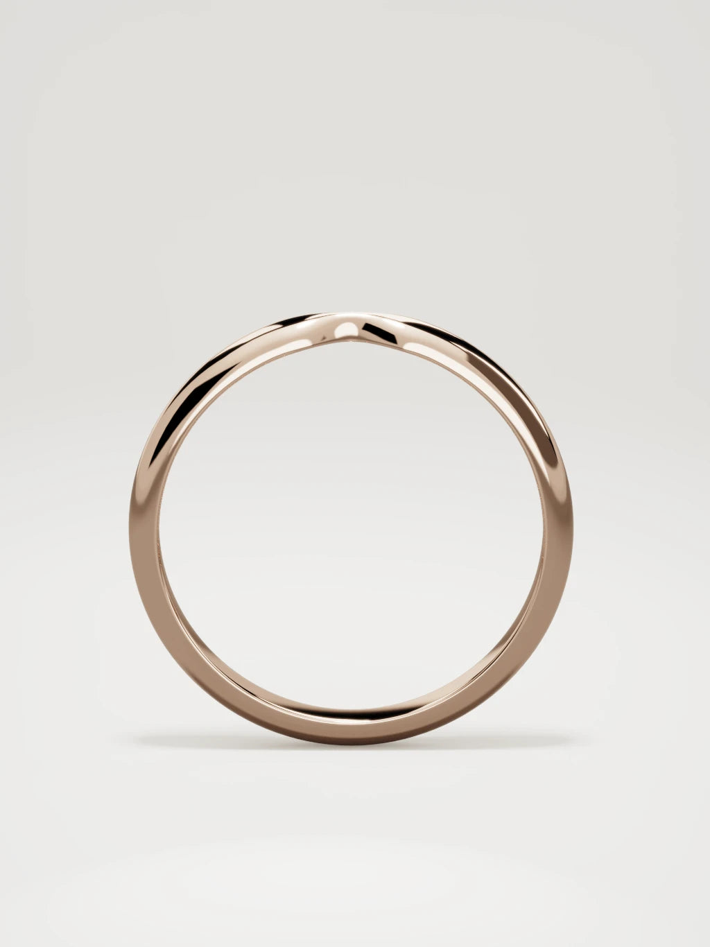The Nido notched contour wedding band in 14K rose gold, standing front view
