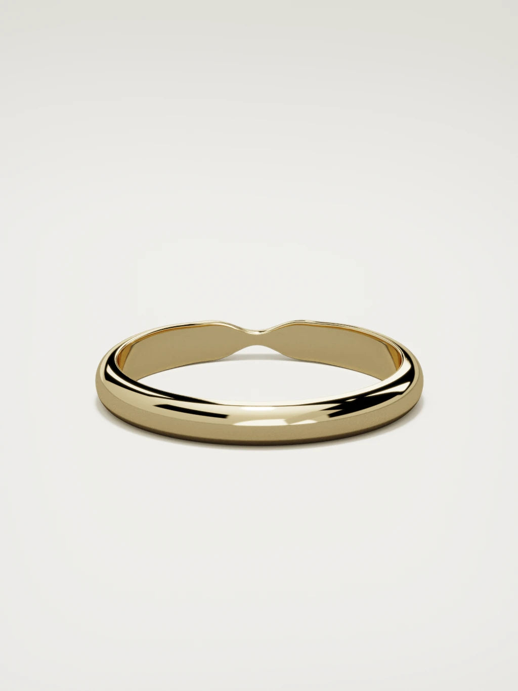 The Nido notched contour wedding band in 14K yellow gold, back view