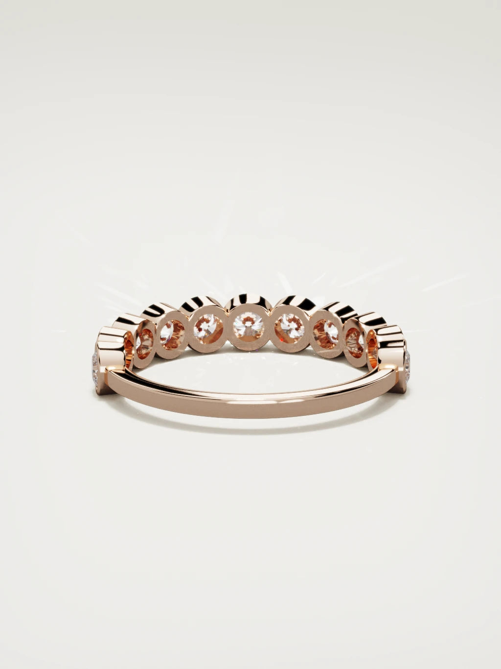 The Perla bezel bubble half eternity band in 14K rose gold, back view